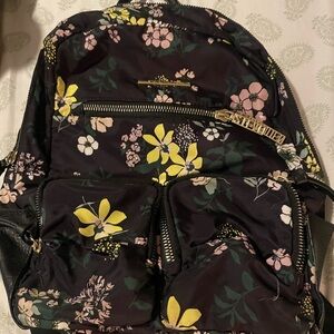 Black and Yellow Floral Backpack with Durable Fabric